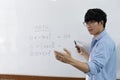 Asian teachers are teaching mathematics classes in addition, subtraction, multiplication, and division in high school or universit