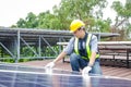 Asian technicians install panels Solar cells