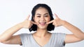 Asian teen facial with braces smiling to camera to show orthodonic teeth Royalty Free Stock Photo