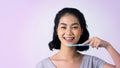 Asian teen facial with braces smiling to camera to show orthodonic teeth Royalty Free Stock Photo