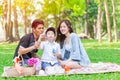 Asian teen family happy holiday picnic Royalty Free Stock Photo