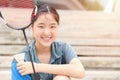 Asian Teen girl sport player with Badminton equipment for healthy outdoor portrait happy smile Royalty Free Stock Photo