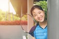 Asian Teen girl sport player with Badminton equipment for healthy outdoor portrait happy smile Royalty Free Stock Photo