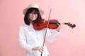 Asian teen with violin glasses hat smile Royalty Free Stock Photo