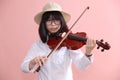 Asian teen with violin glasses hat smile Royalty Free Stock Photo