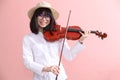 Asian teen with violin glasses hat smile Royalty Free Stock Photo