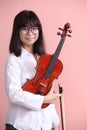 Asian teen with violin glasses smile Royalty Free Stock Photo