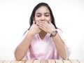 Asian teenage girl covering her mouth Royalty Free Stock Photo