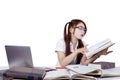 Asian teenage girl studying on table Royalty Free Stock Photo