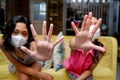 Asian Teenage Girls Wearing Medical Face Mask Making Stopping Signs Gesture with Their Hands