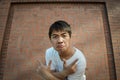 Asian teenage makeing face Royalty Free Stock Photo