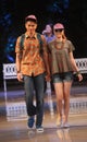 Asian teenage model wearing batik at fashion show runway