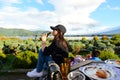 Asian Teenager girl enjoy and holding bottle of beer