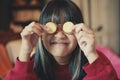 Asian teenager making cream cracker close eye glasses Royalty Free Stock Photo