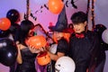 Asian Teenagers in Halloween Costumes, Celebrate The Enchanting Halloween Season. Celebrating Halloween Haunt Party of Asian Style