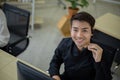 Asian telemarketing agent in call center office Royalty Free Stock Photo