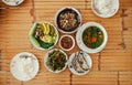 Asian Thai local food served on white plate on bamboo table top Royalty Free Stock Photo