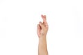 Asian Thai male hand cross finger for goodluck on the clear white background Royalty Free Stock Photo