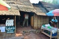 Asian thai old woman people sale food and salt at Ban Bo Kluea village