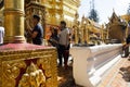 Asian thai people and foreigner respect pray and posing take photo with gold chedi at Wat Phra That Doi Suthep