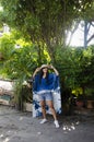 Asian thai woman wearing indigo art clothes for show and portrait at garden
