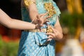 Asian - Thai women dance in Thai traditional Dancing Style with vintage turquoise dress and gold decorative on her dress Royalty Free Stock Photo