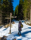 Asian women hiking in the snow at the Brocken mountain during winter in the Harz Germany