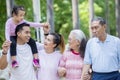 Asian three generation family chatting at outdoors Royalty Free Stock Photo