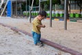 asian toddler boy playing in outdoor playground Royalty Free Stock Photo