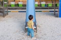 asian toddler boy playing in outdoor playground Royalty Free Stock Photo