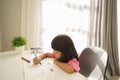 Asian toddler drawing from home Royalty Free Stock Photo