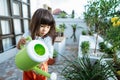 Asian toddler gardening at home Royalty Free Stock Photo