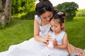 asian toddler kid drinking tasty milkshake