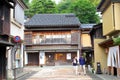 Tourist couple street historic buildings, Kanazawa, Japan Royalty Free Stock Photo