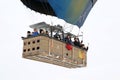Asian Tourist group inside Hot Air Balloon basket and flying over fairy chimneys