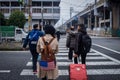 Asian tourist walked cross crosswalk