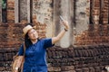 Asian tourist woman selfie at ancient of pagoda temple thai arch Royalty Free Stock Photo