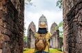 Asian tourist woman take a photo of ancient of pagoda temple thai architecture at Sukhothai,Thailand. Female traveler in casual t
