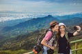 Asian tourists are enjoying the selfie with friends.