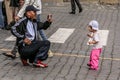 Asian tourists walking around Red Square. Travel around Russia. Royalty Free Stock Photo