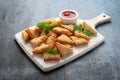 Asian Traditional Prawn Toast with Sesame seeds and sweet chilli sauce on wooden white board Royalty Free Stock Photo