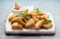 Asian Traditional Prawn Toast with Sesame seeds and sweet chilli sauce on wooden white board Royalty Free Stock Photo
