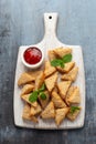 Asian Traditional Prawn Toast with Sesame seeds and sweet chilli sauce on wooden white board Royalty Free Stock Photo