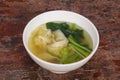 Asian traditional Wonton soup with herbs