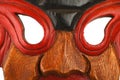 Asian traditional wooden painted mask close up Royalty Free Stock Photo