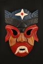 Asian traditional wooden red painted demon mask Royalty Free Stock Photo