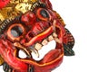 Asian traditional wooden red painted demon mask on white Royalty Free Stock Photo