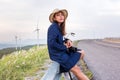 Asian traveler woman in jean dress relaxing holiday