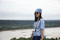 Asian travelers thai women travel and posing at viewpoint cliffs Royalty Free Stock Photo