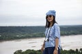 Asian travelers thai women travel and posing at viewpoint cliffs Royalty Free Stock Photo